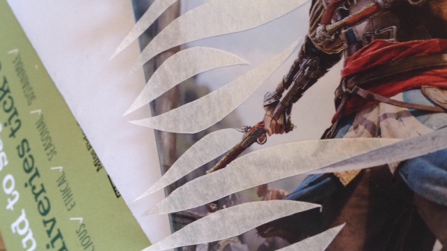 Stripes cut out of masking tape, stuck on a DVD case